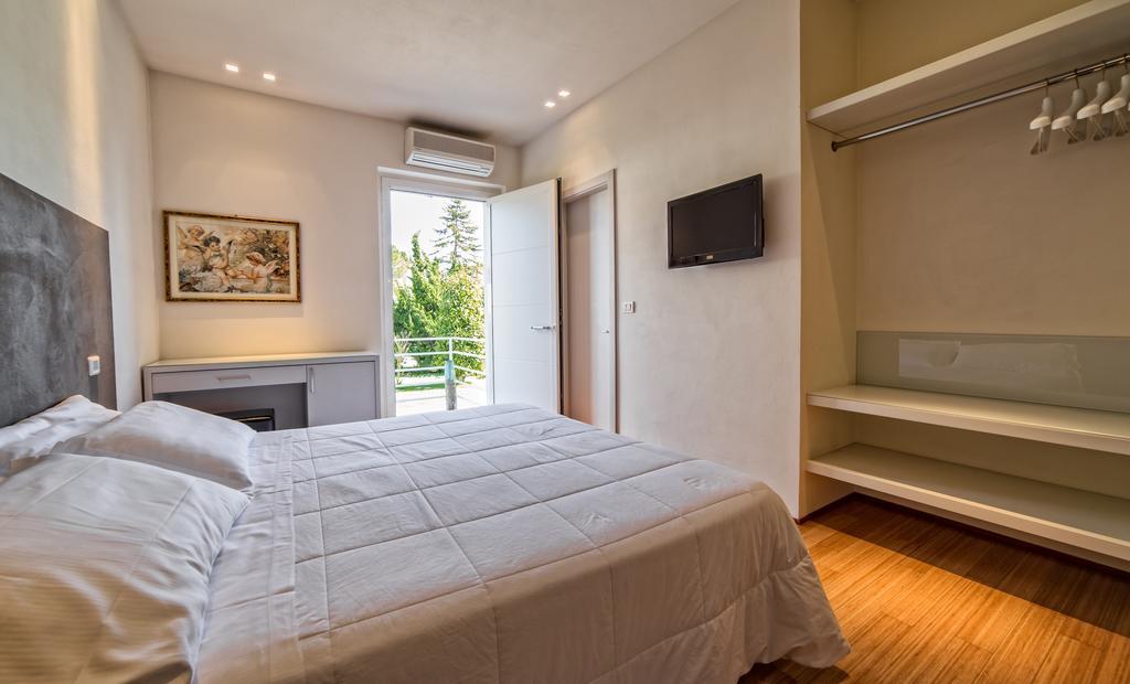 Hotel Country House La Radice Чивітанова-Марке Номер фото
